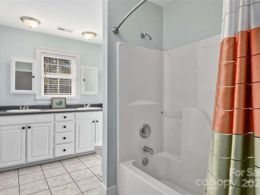 733 Hidden Hills Drive, Rutherfordton, NC 28139.  MLS# CAR4261137, YatesRealty ID 17489. Upper level full bath with tub an shower