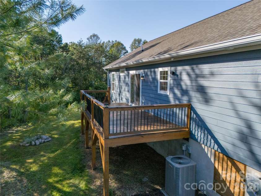 105 Bluebell Ridge Lane, Weaverville, NC 28787.  MLS# CAR4303351, YatesRealty ID 17490. Large back deck and firepit for entertaining.