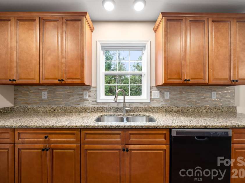 105 Bluebell Ridge Lane, Weaverville, NC 28787.  MLS# CAR4303351, YatesRealty ID 17490. Window above sink overlooking backyard view
