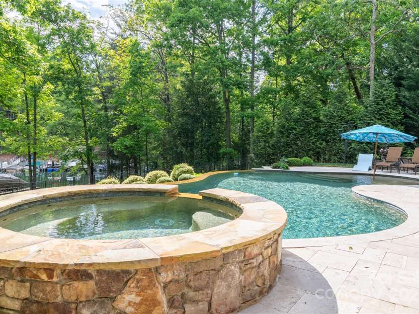 135 Sumter Drive, Mooresville, NC 28117.  MLS# CAR4252213, YatesRealty ID 17490. Even on chillier days and nights, you can enjoy the great outdoors in your hot-tub.