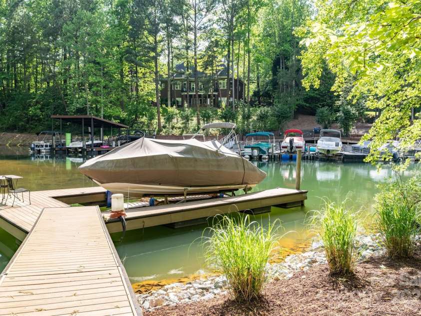 135 Sumter Drive, Mooresville, NC 28117.  MLS# CAR4252213, YatesRealty ID 17490. The floating dock comes with a boatlift.