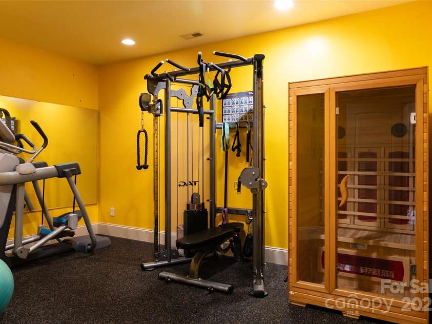 135 Sumter Drive, Mooresville, NC 28117.  MLS# CAR4252213, YatesRealty ID 17490. The workout room is perfect for the gym enthusiasts, yoga practitioners or make it a craft room.
