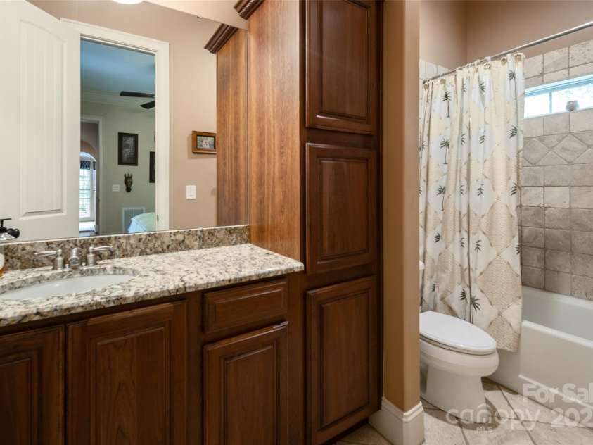 135 Sumter Drive, Mooresville, NC 28117.  MLS# CAR4252213, YatesRealty ID 17490. This enuite belongs to the main level second bedroom.