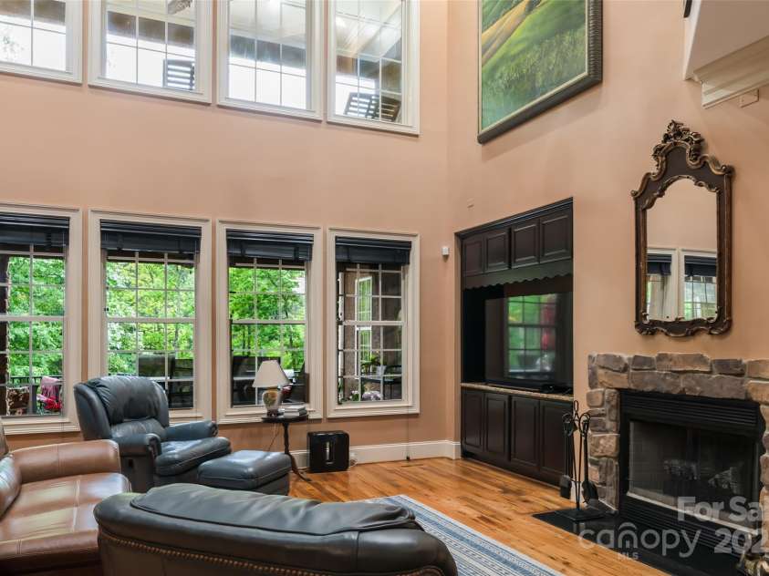 135 Sumter Drive, Mooresville, NC 28117.  MLS# CAR4252213, YatesRealty ID 17490. This luxurious gathering place brings the outdoors in.
