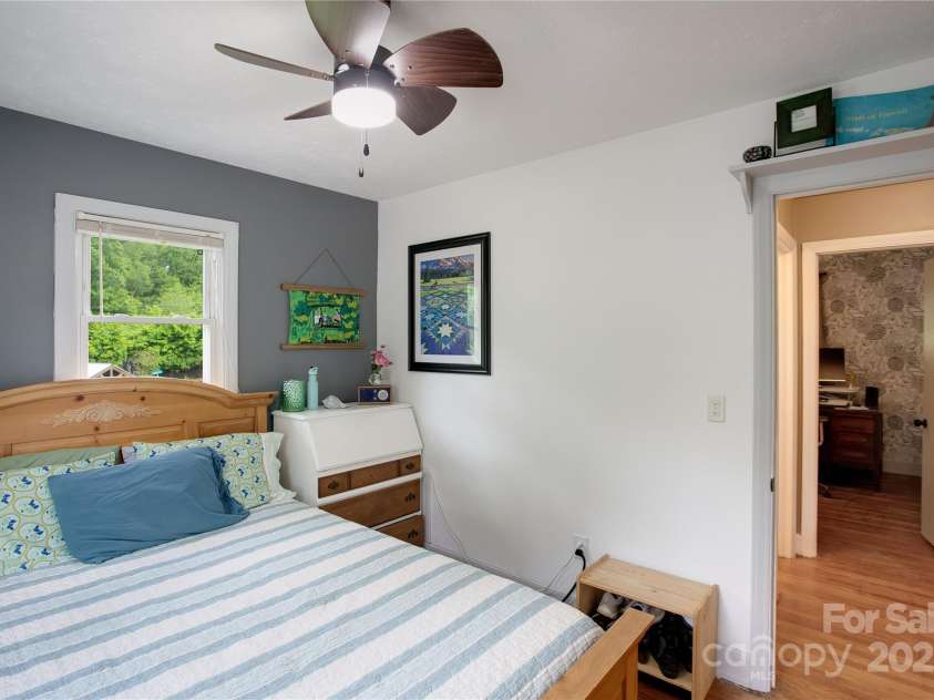 407 Valley View Circle, Waynesville, NC 28786.  MLS# CAR4259161, YatesRealty ID 17492. Bedroom 1 into hall