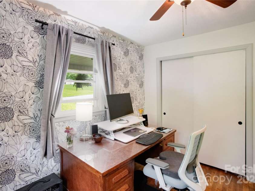407 Valley View Circle, Waynesville, NC 28786.  MLS# CAR4259161, YatesRealty ID 17492. Bedroom 2 with charming accent wall