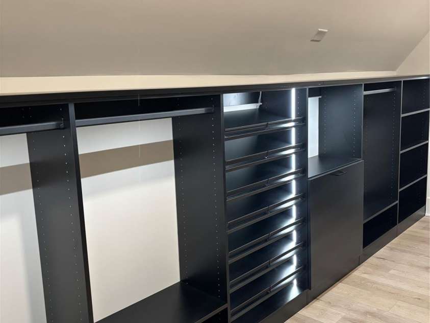 1027 Cox Road, Weddington, NC 28104.  MLS# CAR4299794, YatesRealty ID 17496. Custom primary closet with hidden back closet