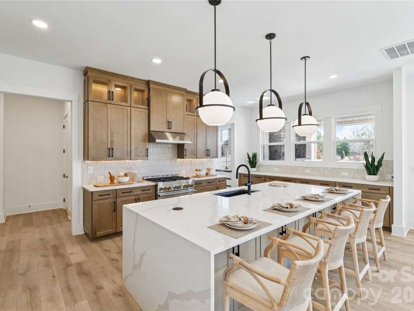1027 Cox Road, Weddington, NC 28104.  MLS# CAR4299794, YatesRealty ID 17496. Gourmet kitchen 