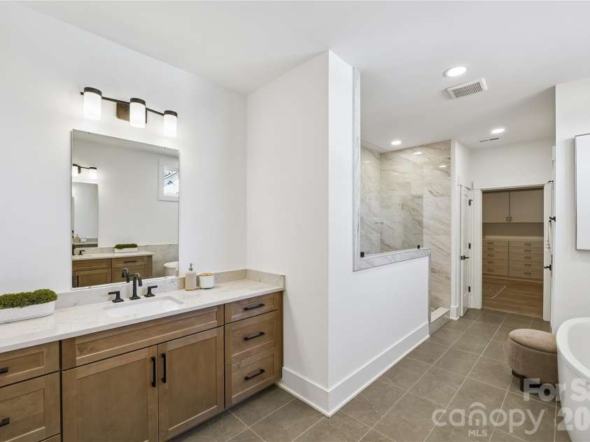 1027 Cox Road, Weddington, NC 28104.  MLS# CAR4299794, YatesRealty ID 17496. Primary bath 