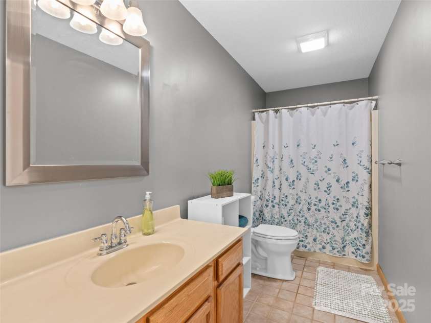 575 Upper Glady Fork Road, Candler, NC 28715.  MLS# CAR4258115, YatesRealty ID 17496. 2nd full bathroom