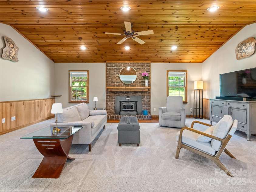575 Upper Glady Fork Road, Candler, NC 28715.  MLS# CAR4258115, YatesRealty ID 17496. Plenty of space to gather around fireplace
