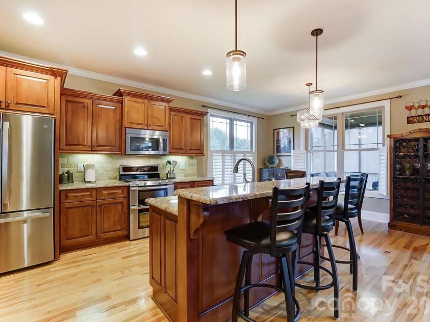 505 Williamsfield Drive, Shelby, NC 28150.  MLS# CAR4351239, YatesRealty ID 17504. The two-tiered island offers additional seating.