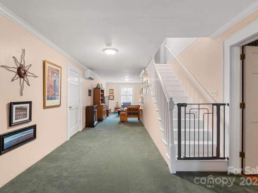 1335 Marion Street, Shelby, NC 28150.  MLS# CAR4220085, YatesRealty ID 17505. Entire view with stairs leading to 3rd floor unfinished attic space