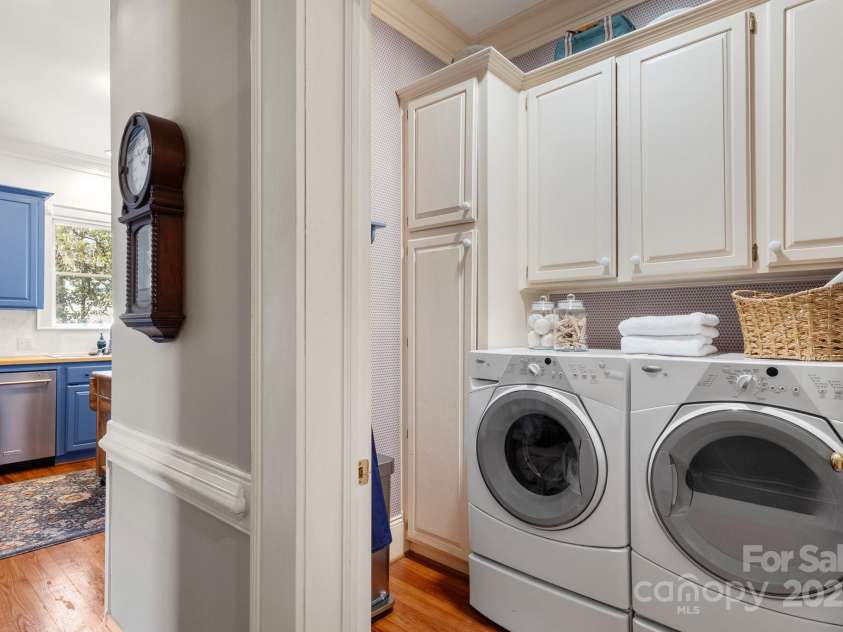 1335 Marion Street, Shelby, NC 28150.  MLS# CAR4220085, YatesRealty ID 17505. Laundry room has tons of extra cabinetry!