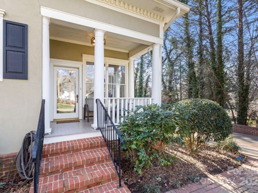 1335 Marion Street, Shelby, NC 28150.  MLS# CAR4220085, YatesRealty ID 17505. Quaint covered back porch for easy access to the kitchen!