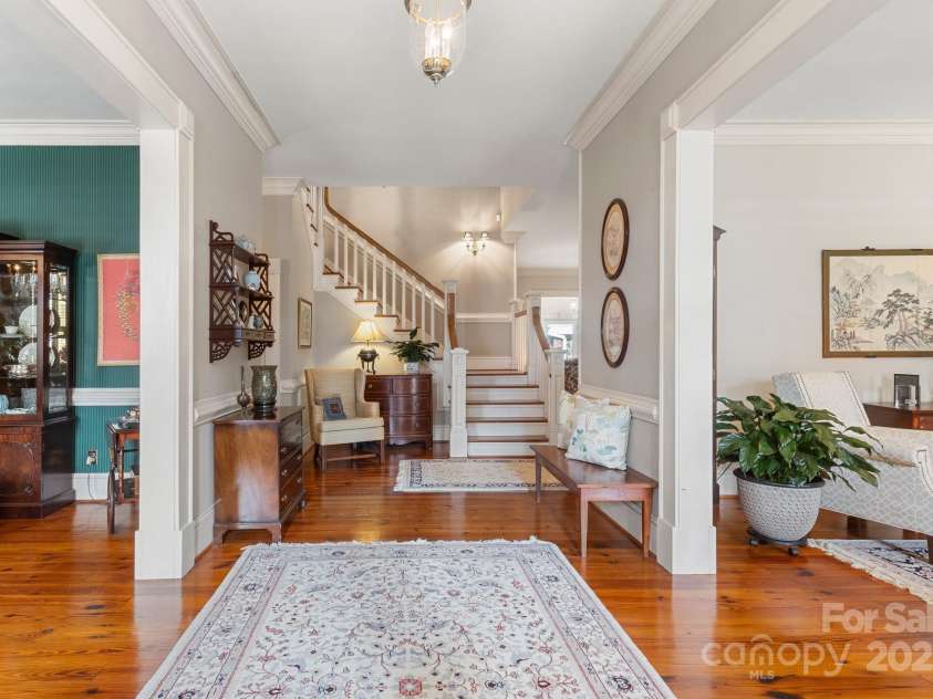 1335 Marion Street, Shelby, NC 28150.  MLS# CAR4220085, YatesRealty ID 17505. View of the beautiful central staircase