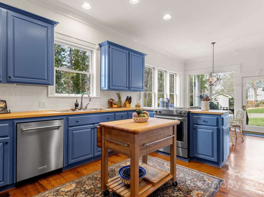 1335 Marion Street, Shelby, NC 28150.  MLS# CAR4220085, YatesRealty ID 17505. With custom cabinetry, butcher block countertops,...