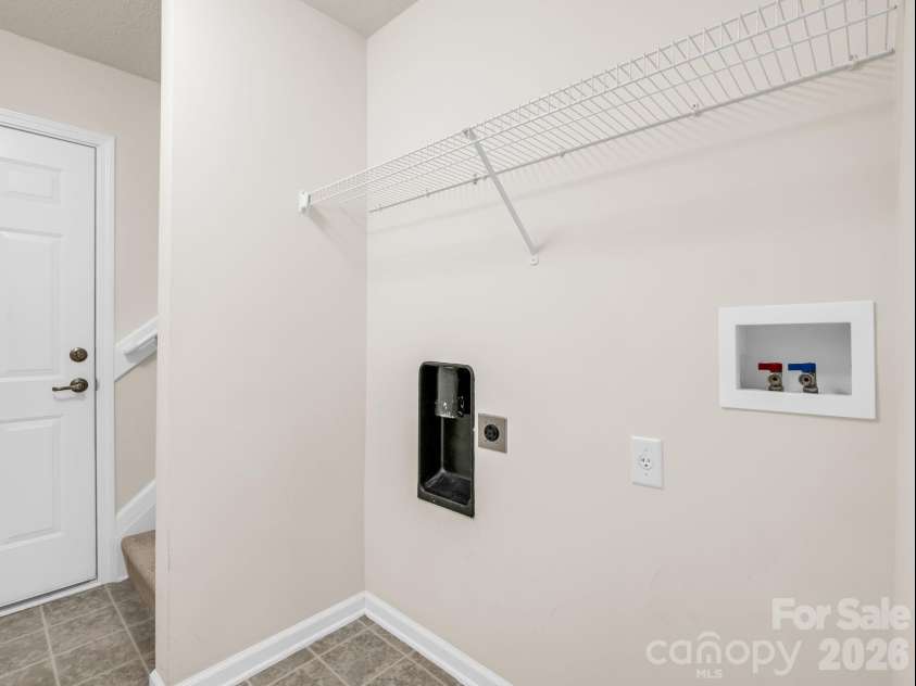 38 Black River Road, Fletcher, NC 28732.  MLS# CAR4372996, YatesRealty ID 17508. Laundry room, just off the garage