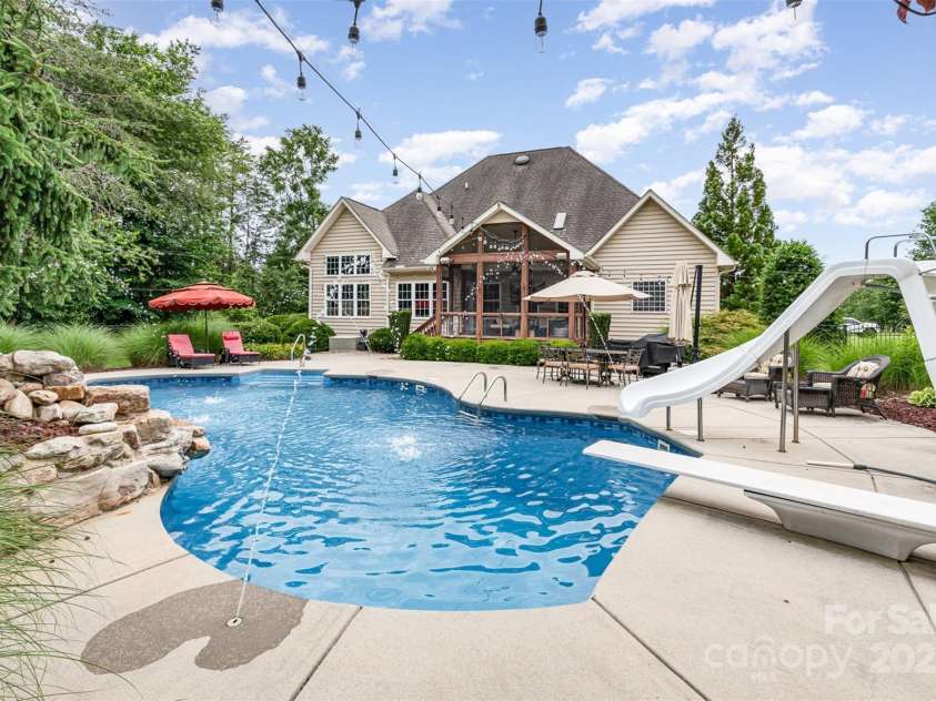 6057 Erie View Court, Denver, NC 28037.  MLS# CAR4263193, YatesRealty ID 17508. Fabulous outdoor area with inground pool