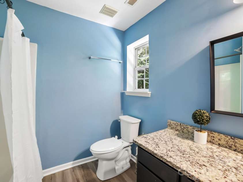 5427 Kimmerly Woods Drive, Charlotte, NC 28215.  MLS# CAR4376319, YatesRealty ID 17515. 