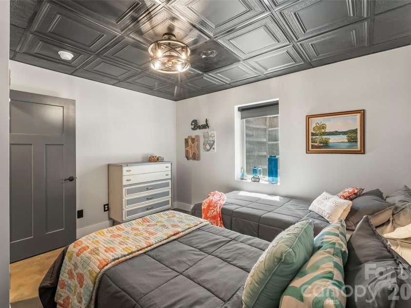 94 Osprey Roost Drive, Nebo, NC 28761.  MLS# CAR4296023, YatesRealty ID 17519. Lower level bedroom