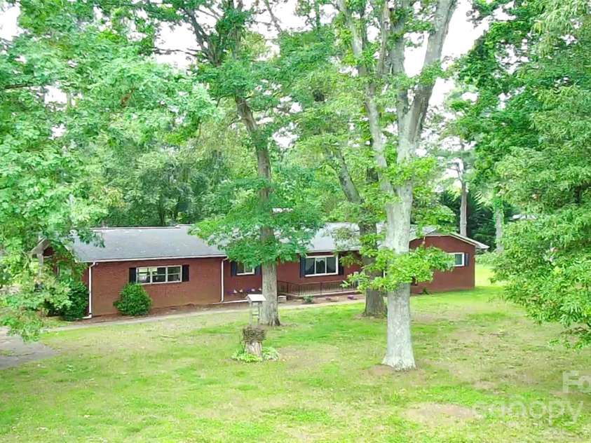 3158 Salisbury Highway, Statesville, NC 28677.  MLS# CAR4266177, YatesRealty ID 17524. Shaded private acreage