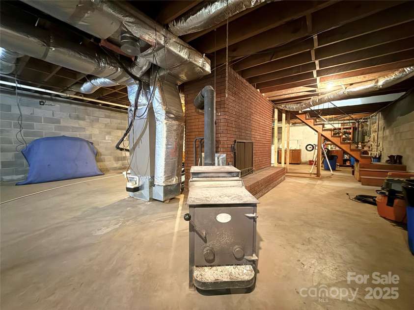 3158 Salisbury Highway, Statesville, NC 28677.  MLS# CAR4266177, YatesRealty ID 17524. Wood stove