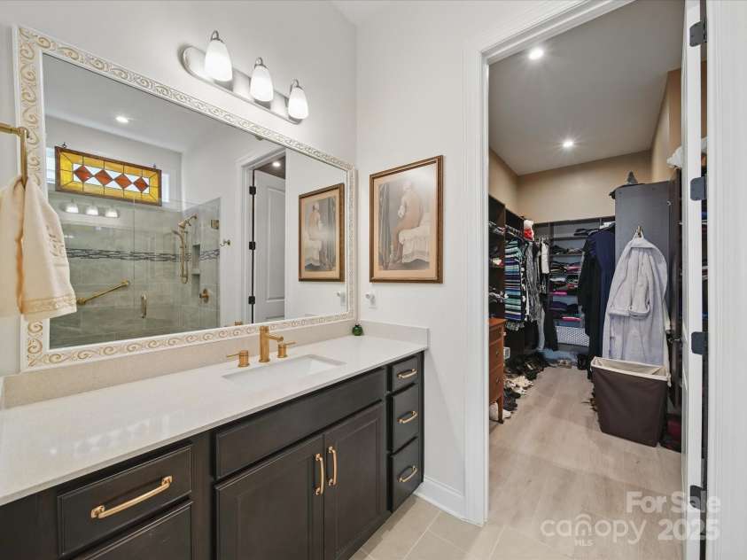 6015 Waldorf Avenue, Monroe, NC 28110.  MLS# CAR4266033, YatesRealty ID 17527. Primary Bathroom w/Walk in closet