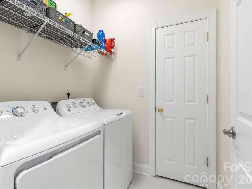 140 Foxfield Park Drive, Mooresville, NC 28115.  MLS# CAR4374750, YatesRealty ID 17530. Laundry Main Floor