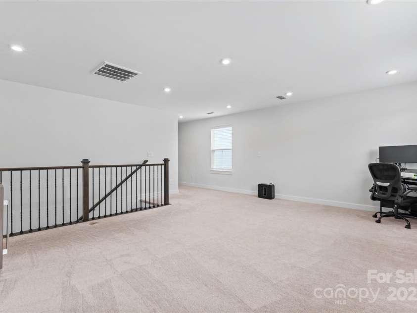 1409 Augustus Beamon Drive, Indian Trail, NC 28079.  MLS# CAR4241374, YatesRealty ID 17533. Upstairs Livingroom / Rec space