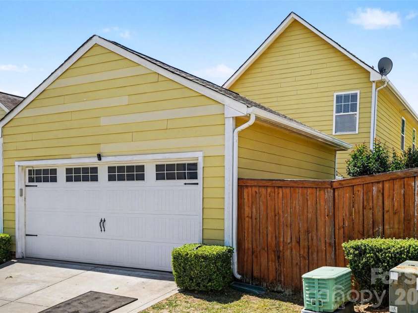 12521 Druids Glen Drive, Pineville, NC 28134.  MLS# CAR4372113, YatesRealty ID 17534. Detached 2 Car Garage