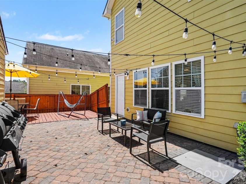 12521 Druids Glen Drive, Pineville, NC 28134.  MLS# CAR4372113, YatesRealty ID 17534. Private Backyard Patio/Deck