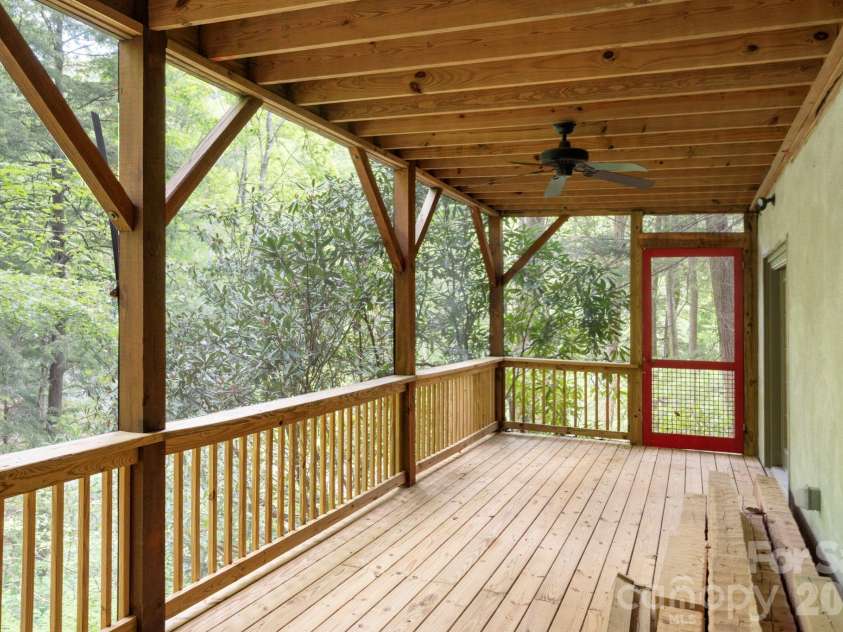 14 Weeping Cherry Forest Road, Fairview, NC 28730.  MLS# CAR4356619, YatesRealty ID 17536. Downstairs screened-in porch.