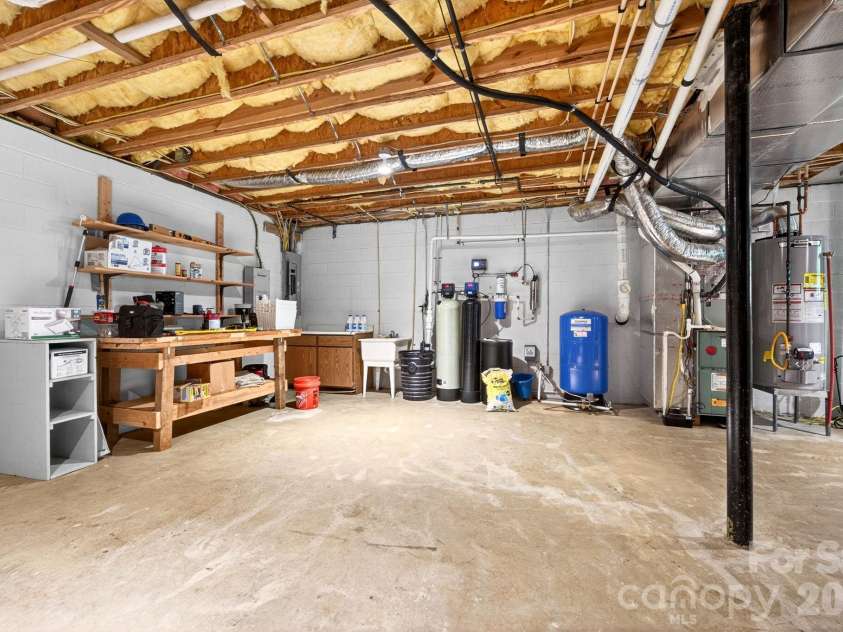 14 Weeping Cherry Forest Road, Fairview, NC 28730.  MLS# CAR4356619, YatesRealty ID 17536. Expansive basement area! Finish out for additional living area if needed.