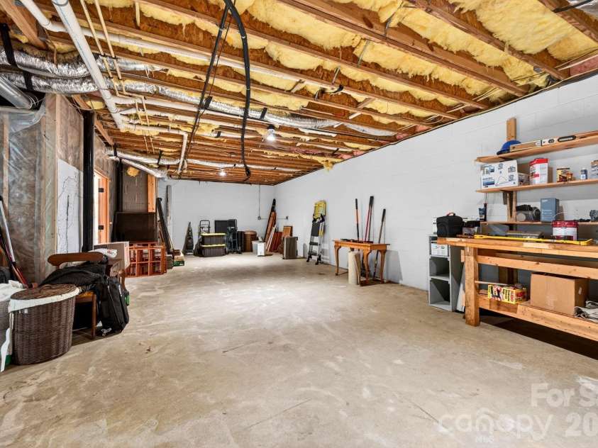 14 Weeping Cherry Forest Road, Fairview, NC 28730.  MLS# CAR4356619, YatesRealty ID 17536. Expansive basement area! Finish out for additional living area if needed.