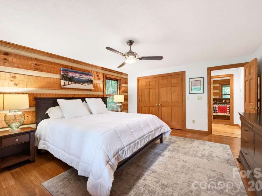 14 Weeping Cherry Forest Road, Fairview, NC 28730.  MLS# CAR4356619, YatesRealty ID 17536. Large primary bedroom with en-suite bath.