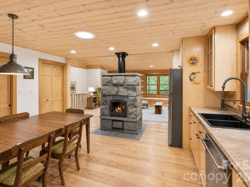 14 Weeping Cherry Forest Road, Fairview, NC 28730.  MLS# CAR4356619, YatesRealty ID 17536. TWO-WAY soapstone fireplace!