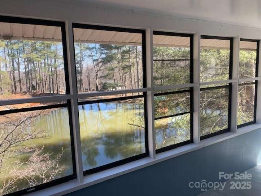 30 LAKEMONT COTTAGE Trail, Flat Rock, NC 28731.  MLS# CAR4232172, YatesRealty ID 1754. 