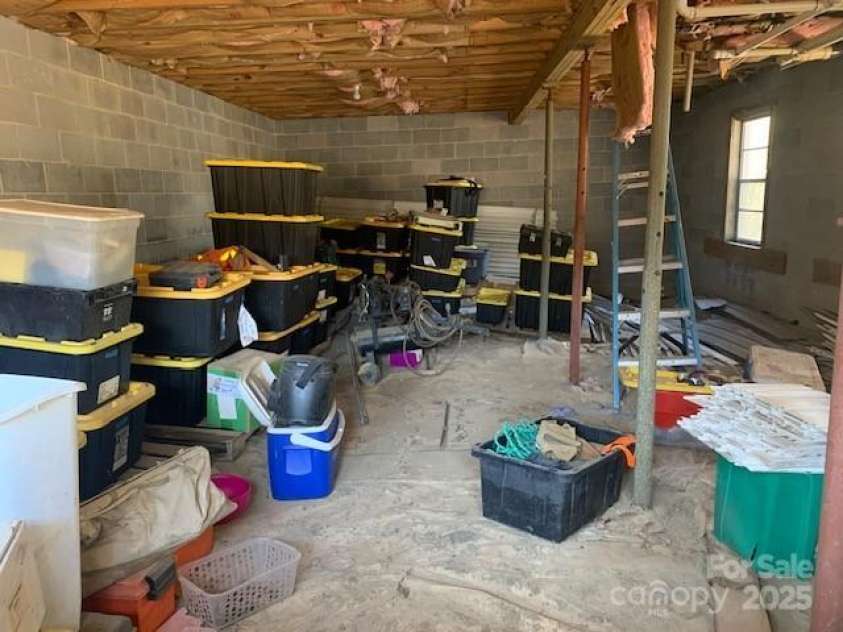 30 LAKEMONT COTTAGE Trail, Flat Rock, NC 28731.  MLS# CAR4232172, YatesRealty ID 1754. BASEMENT GARAGE WITH DOOR ... AND