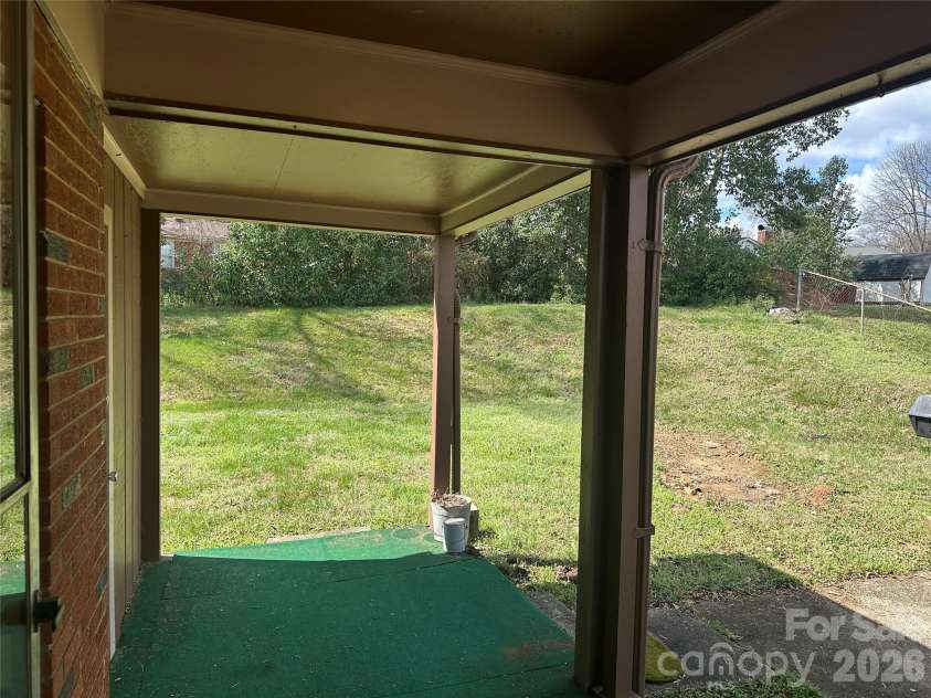 1435 Dean Street, Charlotte, NC 28216.  MLS# CAR4429193, YatesRealty ID 17541. Covered Patio