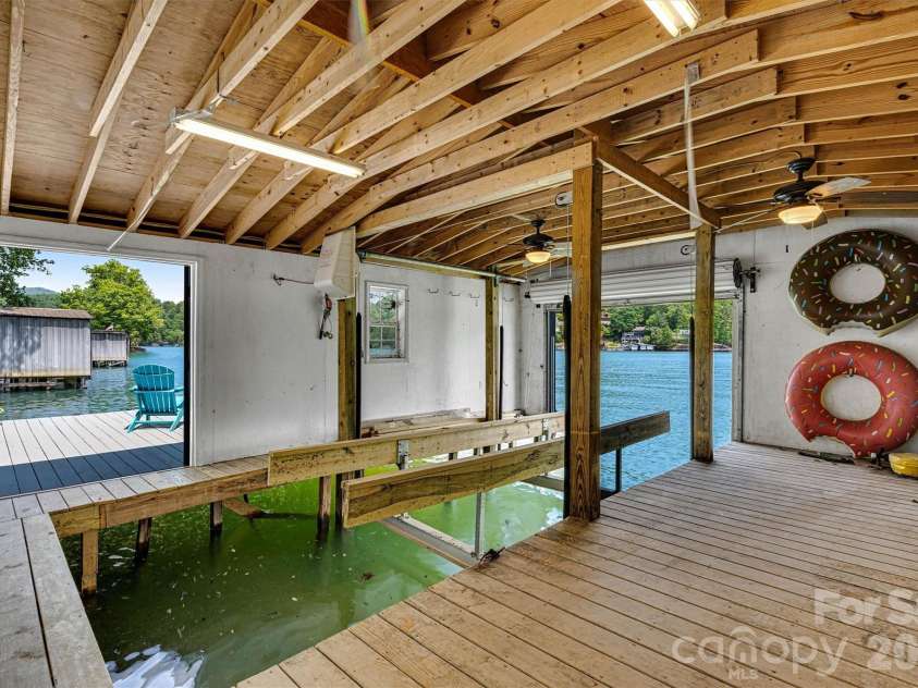 462 Charlotte Drive, Lake Lure, NC 28746.  MLS# CAR4375186, YatesRealty ID 17548. Boathouse