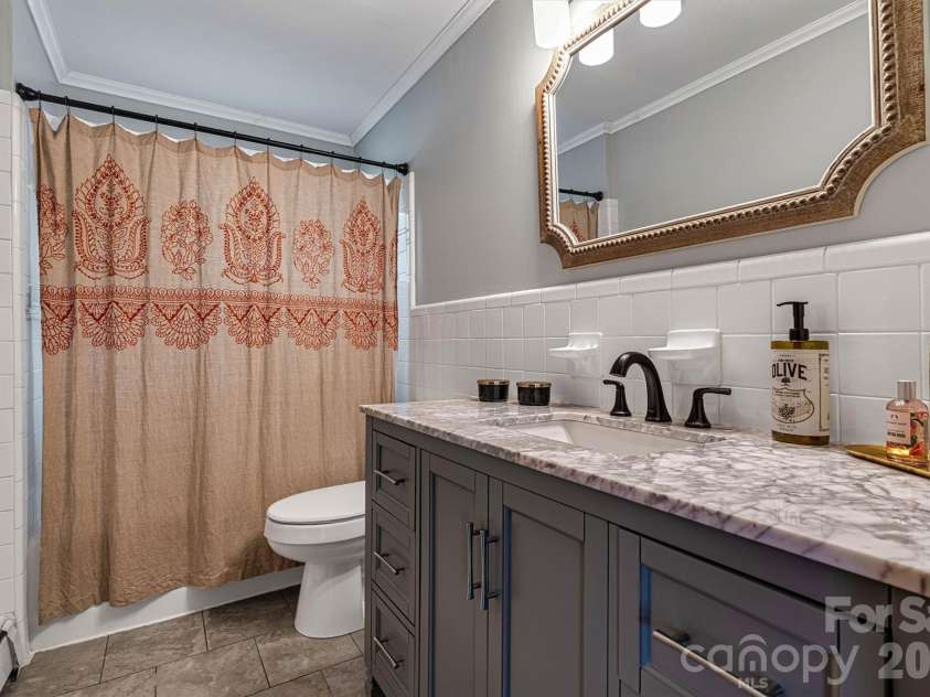 462 Charlotte Drive, Lake Lure, NC 28746.  MLS# CAR4375186, YatesRealty ID 17548. Full bath on Main