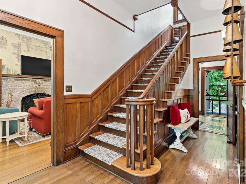 147 Preservation Way, Waynesville, NC 28786.  MLS# CAR4264584, YatesRealty ID 17550. Grand Staircase