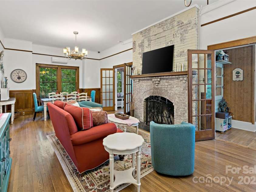 147 Preservation Way, Waynesville, NC 28786.  MLS# CAR4264584, YatesRealty ID 17550. Living room with fireplace