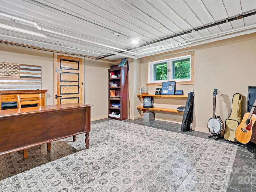 147 Preservation Way, Waynesville, NC 28786.  MLS# CAR4264584, YatesRealty ID 17550. Office or hobby room in the basement