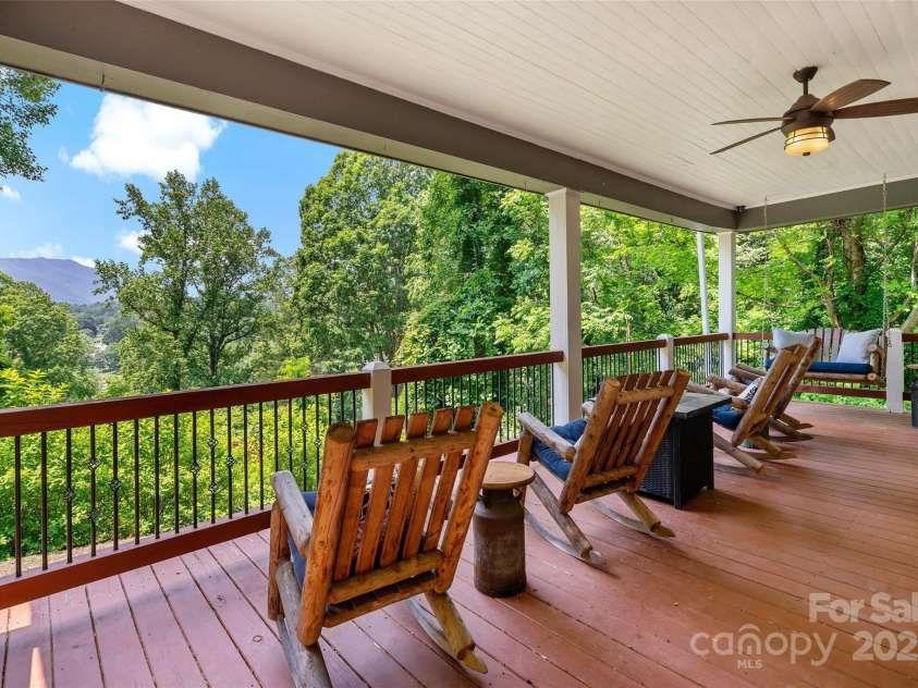 147 Preservation Way, Waynesville, NC 28786.  MLS# CAR4264584, YatesRealty ID 17550. Side porch with a view
