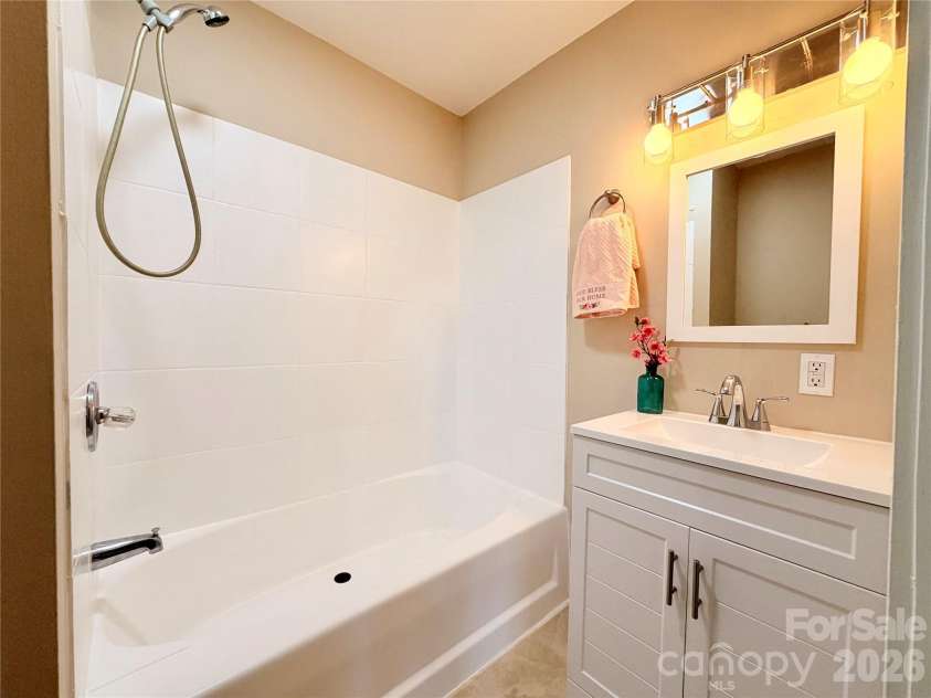 18 MIDWAY Street, Granite Falls, NC 28630.  MLS# CAR4373121, YatesRealty ID 17554. Updated bathroom