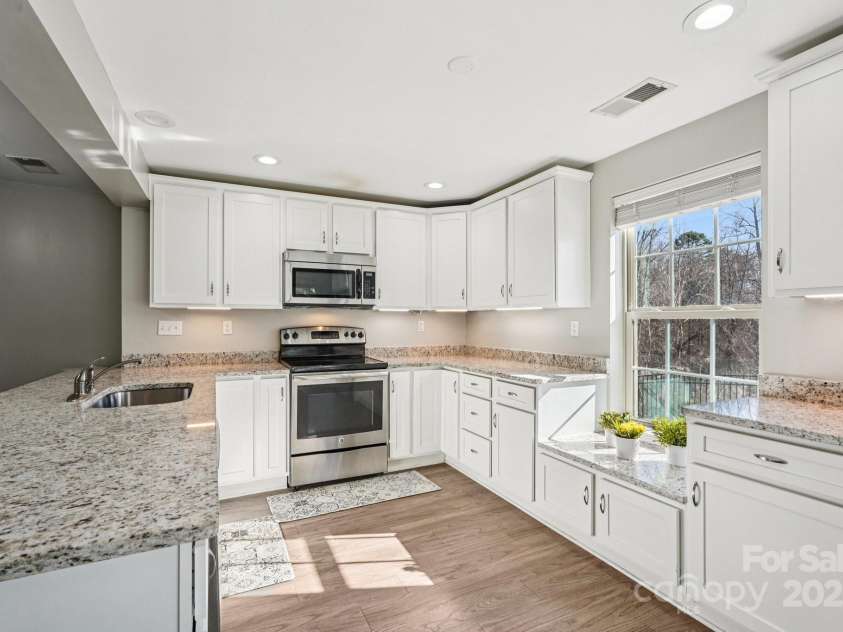 2271 Stone Pile Drive, Concord, NC 28025.  MLS# CAR4330915, YatesRealty ID 17561. Basement kitchen