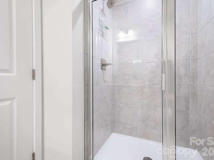 1226 Gleason Way, Charlotte, NC 28217.  MLS# CAR4405911, YatesRealty ID 17562. Fourth-floor bathroom with shower