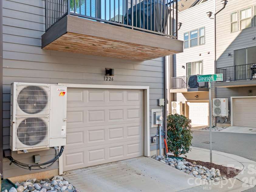 1226 Gleason Way, Charlotte, NC 28217.  MLS# CAR4405911, YatesRealty ID 17562. Oversized garage with extra space — room for a treadmill or additional storage